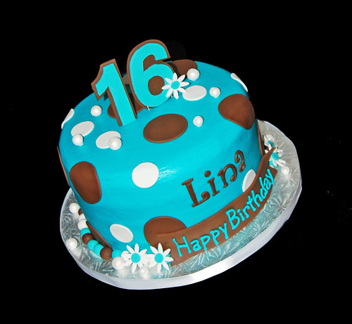 turquoise and brown sweet 16 cake with polka dots, flowers and pearls