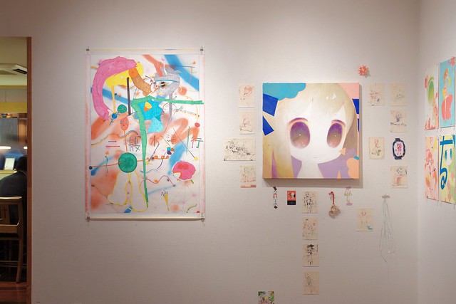 Hiroyuki Nisougi's artwork (left) and Mitsugo's artworks (right)