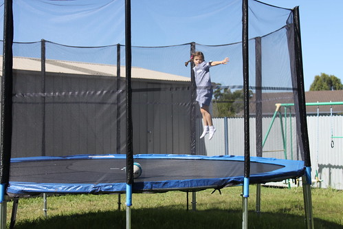 Esther up on trampoline