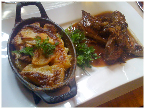 Veal hanger steak with a side of gratin dauphinois at La Table du 9 located in Geneva's Old Town