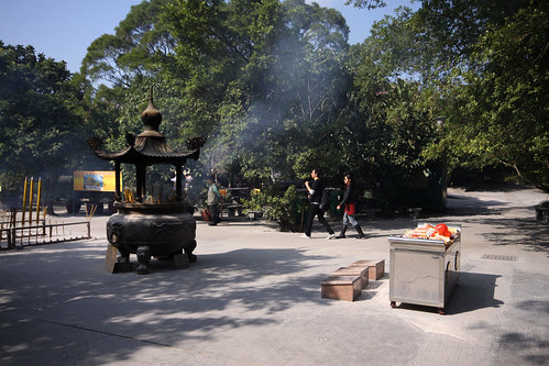 Burning incense outside the temple