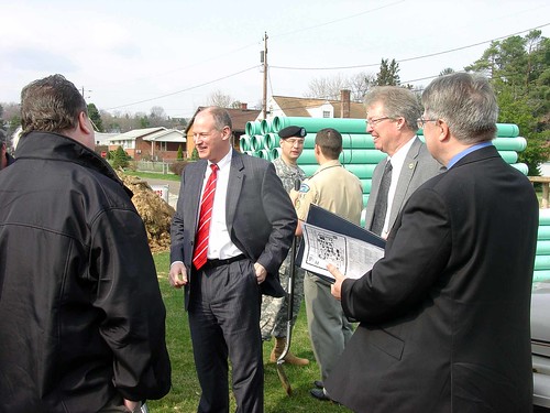 Congressman Mark Critz, center, Col. William H. Graham, District Engineer, US Army Corps of Engineers, back, and Thomas P. Williams, USDA Rural Development State Director, right, talk with local residents at the Washington Township Phase II Sewer Project Groundbreaking on March 21, 2011. 
