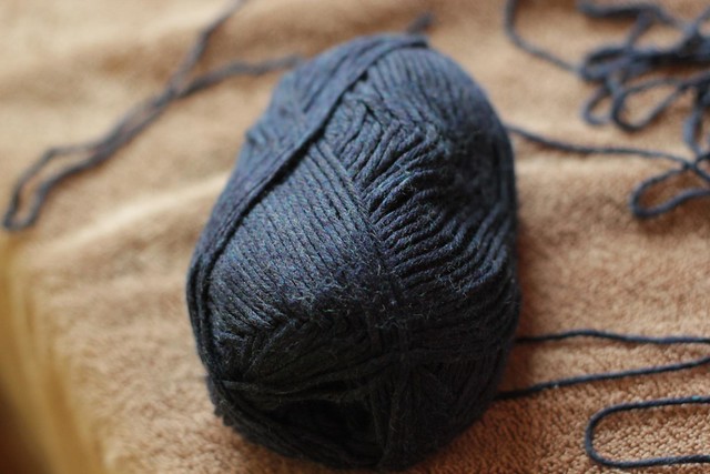 organic cotton dark colored yarn drying after soak in vinegar and salt mixture to avoid color bleed