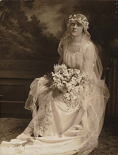 This wedding dress from 1915 is a simple dress made of silk and tulle Lace