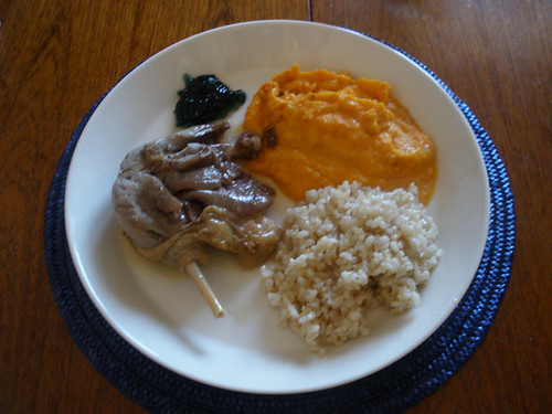Duck leg with rice and sweet potato & carrot dish