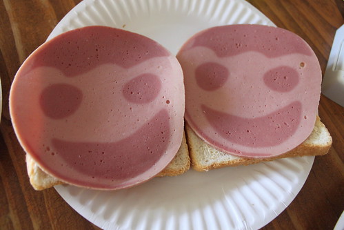 Creepy smiley loaf sandwiches