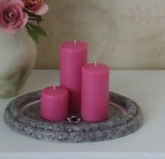 Pink candles on tray
