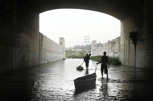Kayakers make their way down the LA River near Atwater Village on Thursday, July 22, 2010