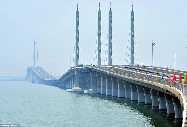 That is a £1bn bridge too far World's longest sea bridge opens to traffic in China... but it will only hold the title for five years  10