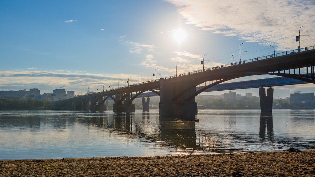 : morning. road bridge across the Ob river