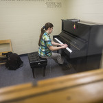 Student playing piano.