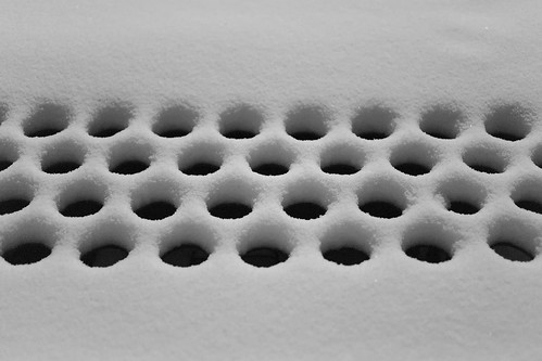 Holes in the snow ©  Mikhail Kryshen