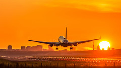 Boeing 767 on approach during sunrise • <a style="font-size:0.8em;" href="http://www.flickr.com/photos/125767964@N08/20349050508/" target="_blank">View on Flickr</a>