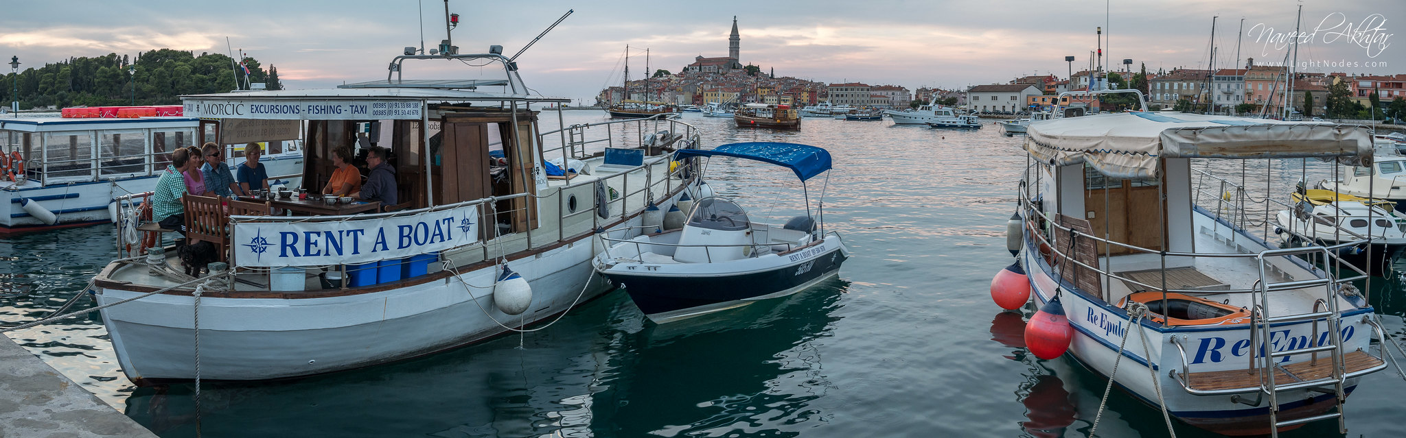 Little boat party at coastal town Rovinj, Croatia with Lumix GX7 4K