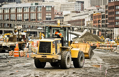 Loader in viaduct replacement construction zone
