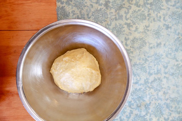 dough ball in a mixing bowl