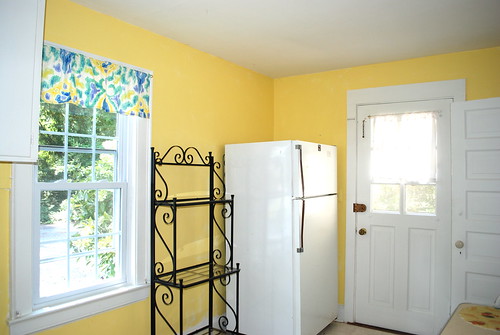 yellow cottage kitchen before