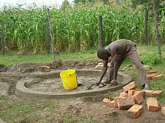 Mutsembi(shiloh) Nursery school-plastering well pad during construction process