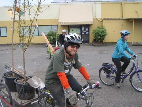 Friends of Trees volunteers planting by bike!