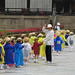 Teacher gets kids to wave at Todai-ji in Nara, Japan