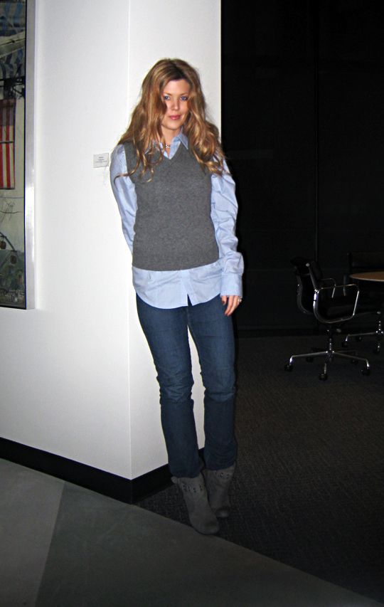 preppy sweater vest over a button down with jeans and boots in the gallery+sharp