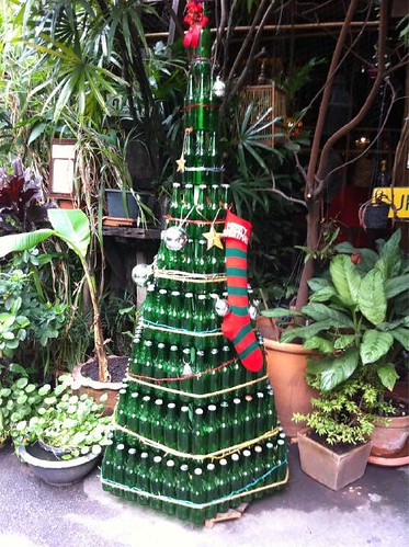 xmas tree made of empty beer bottles - Heineken, it lights at night