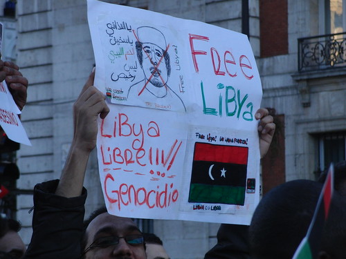 Cartel: "Freey Libya, genocidio"