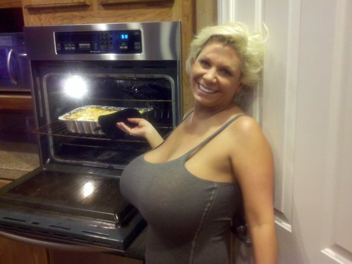 Claudia-Marie big fake tits cooking at home
