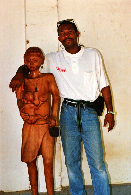 Togo West Africa Ethnic Cultural Wood Carvings Palimé formerly known as Kpalimé is a city in Plateaux Region Togo near the Ghanaian border 23 April 1999 205<br/>© <a href="https://flickr.com/people/41087279@N00" target="_blank" rel="nofollow">41087279@N00</a> (<a href="https://flickr.com/photo.gne?id=14030536434" target="_blank" rel="nofollow">Flickr</a>)