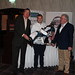 Terence Kenny, Pannier & Joe Dolan, IHF President, present first prize to Niall Lenehan, Net Affinity