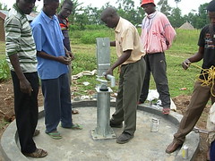 Attachment of pump water tank during pump installation at Bumang'ale Nursery school well