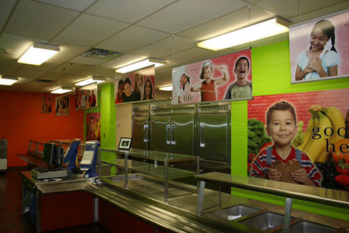 Hanging and wall signs in cafeteria made by 12-Point SignWorks Franklin TN