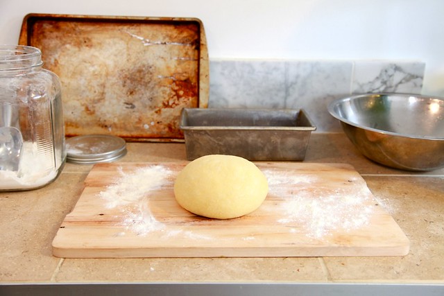 ball of dough on floured surface