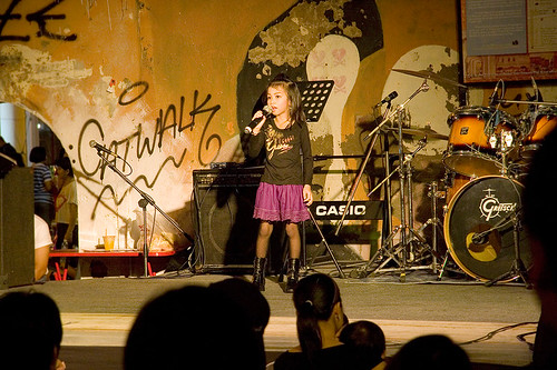 Young singer on stage