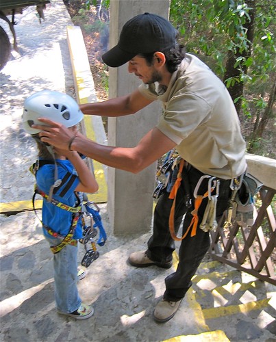 getting ready for a zip line, canopy tour guatemala