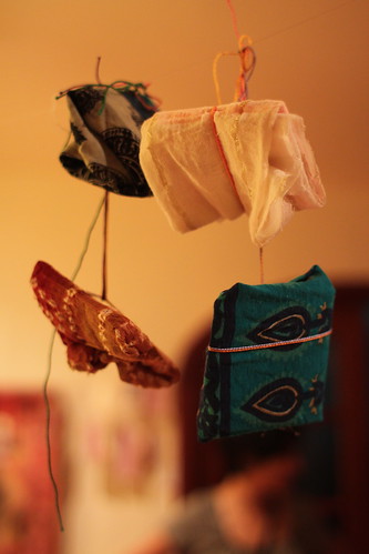 Women's stories wrapped in fabric donated by Pakistani community