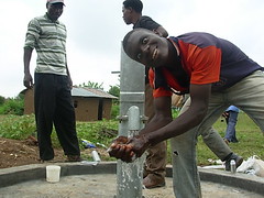 Water flowing after pump installation at Bumang'ale Nursery school well