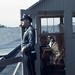 Airplane spotters Officer Cable and Mrs. Jorgensen on the roof of Beach Hall, 1944