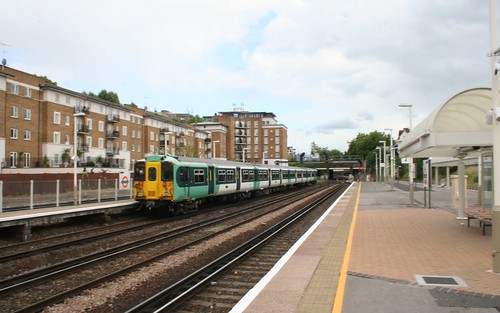 Now a normal train, leaving Kensington Olympia