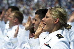 U.S. Navy ensign takes the oath of office at t...