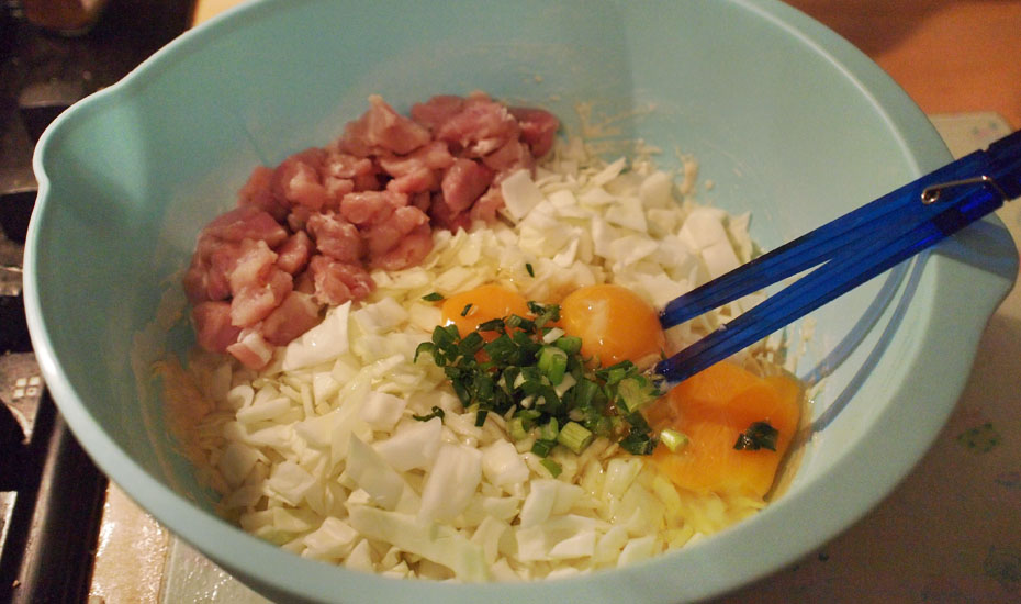Step 3: Add cabbage, eggs, spring onion and your choice of meat/veg