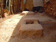Interior of toilet, pit hole