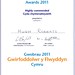 Rhoddwyd y wobr yma i ni fel Cymuned / This Award was given to us as a Community