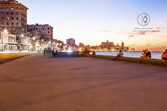 The Malecon boardwalk at sunset.