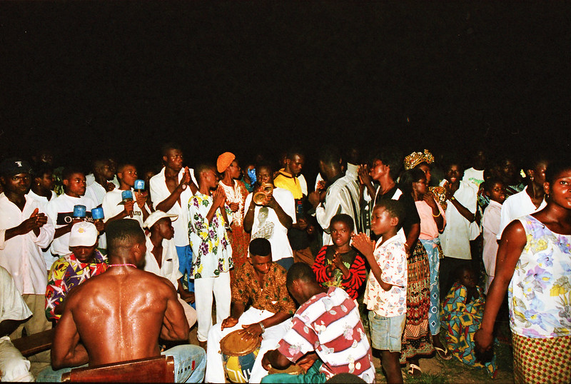 Togo West Africa Ethnic Cultural Dancing and Drumming African Village close to Palimé formerly known as Kpalimé a city in Plateaux Region Togo near the Ghanaian border 24 April 1999 161<br/>© <a href="https://flickr.com/people/41087279@N00" target="_blank" rel="nofollow">41087279@N00</a> (<a href="https://flickr.com/photo.gne?id=14016368035" target="_blank" rel="nofollow">Flickr</a>)