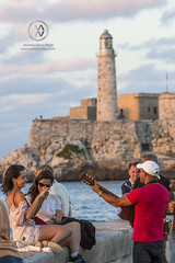 Musicians seranade tourists in Havana.