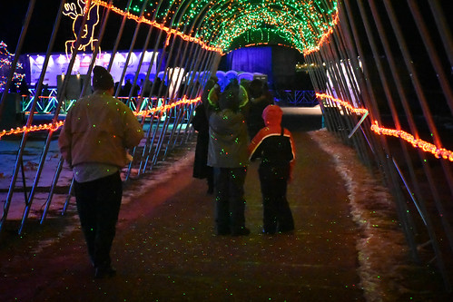 Kai and Nora walk under the projected lights. • <a style="font-size:0.8em;" href="http://www.flickr.com/photos/96277117@N00/30976082493/" target="_blank">View on Flickr</a>