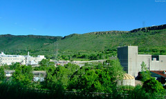 Coors factory buildings before green ridge • <a style="font-size:0.8em;" href="http://www.flickr.com/photos/34843984@N07/15542443721/" target="_blank">View on Flickr</a>