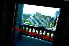 Red Danger tape to stop balcony access • <a style="font-size:0.8em;" href="http://www.flickr.com/photos/34843984@N07/15541639801/" target="_blank">View on Flickr</a>