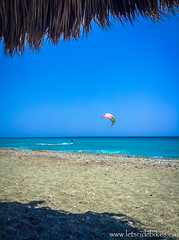 Flying kites in Playa Imias, Cuba.